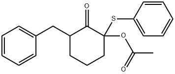 2-アセチルオキシ-6-フェニルメチル-2-(フェニルチオ)シクロヘキサノン 化学構造式