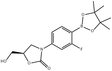 (5R)-3-[3-フルオロ-4-(4,4,5,5-テトラメチル-1,3,2-ジオキサボロラン-2-イル)フェニル]-5-(ヒドロキシメチル)-2-オキサゾリジノン 化学構造式