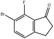 6-broMo-7-fluoro-2,3-dihydro-1H-inden-1-one Struktur
