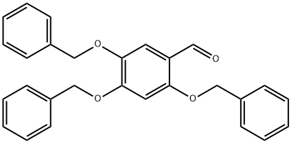 Benzaldehyde, 2,4,5-tris(phenylmethoxy)-