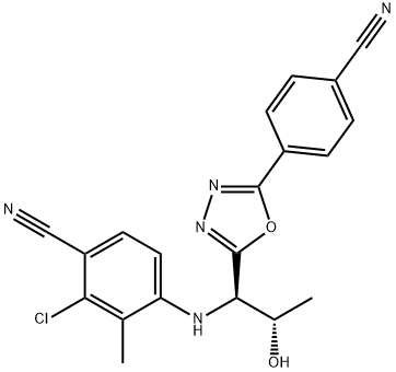 2-クロロ-4-[[(1R,2S)-1-[5-(4-シアノフェニル)-1,3,4-オキサジアゾール-2-イル]-2-ヒドロキシプロピル]アミノ]-3-メチルベンゾニトリル 化学構造式