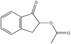 2-Acetoxy-2,3-dihydro-1H-indene-1-one 结构式
