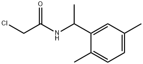 2-クロロ-N-[1-(2,5-ジメチルフェニル)エチル]アセトアミド 化学構造式