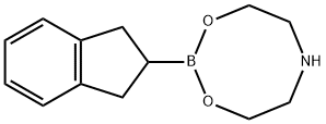 2-(インダン-2-イル)-1,3-ジオキサ-6-アザ-2-ボラシクロオクタン 化学構造式