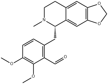 (+)-2,3-ジメトキシ-6-[[(5R)-5,6,7,8-テトラヒドロ-6-メチル-1,3-ジオキソロ[4,5-g]イソキノリン-5-イル]メチル]ベンズアルデヒド 化学構造式